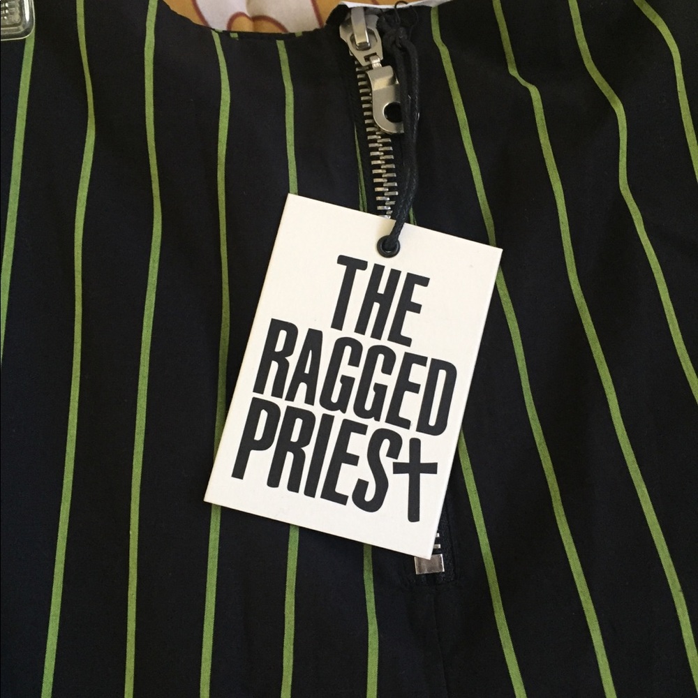 Black pants with green pinstripes